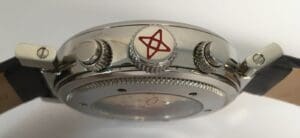 Side view of a watch with logo.