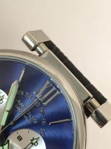 Close-up of a blue watch face.