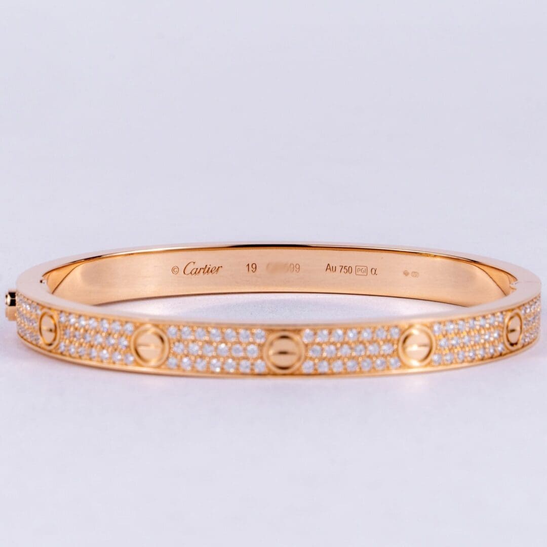 Gold and diamond Cartier bangle bracelet.