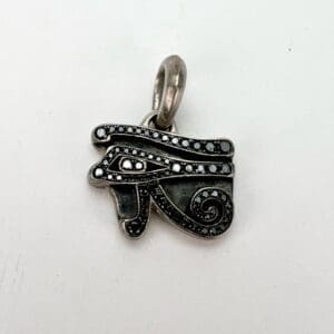 Silver Eye of Horus pendant charm.