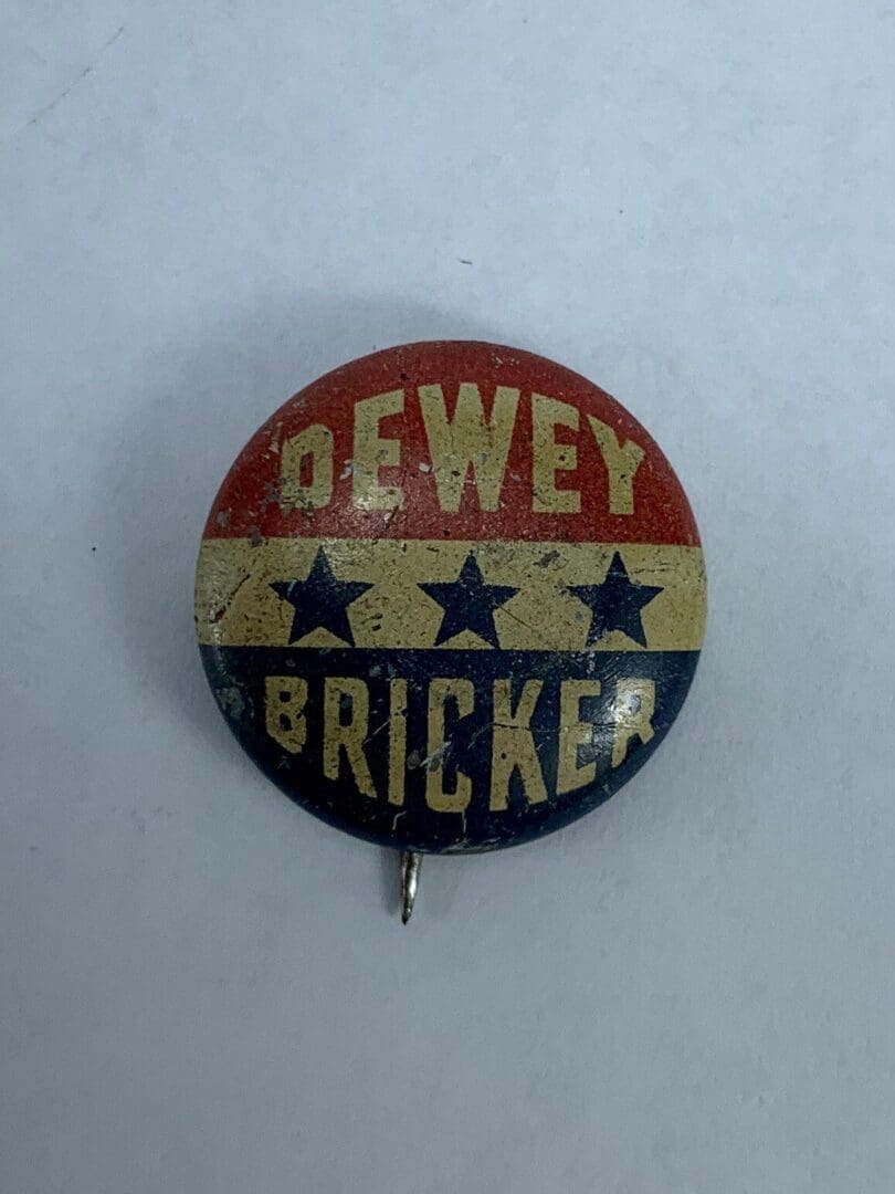 Dewey Bricker campaign button with stars.