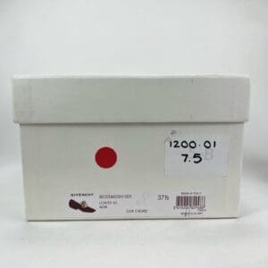 White shoe box with product labels.