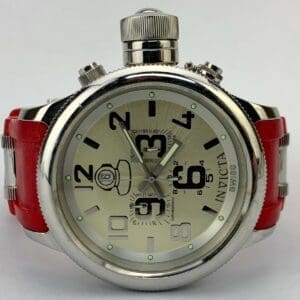 Silver watch with red strap, white background.