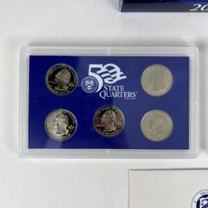 50 State Quarters in protective display case.