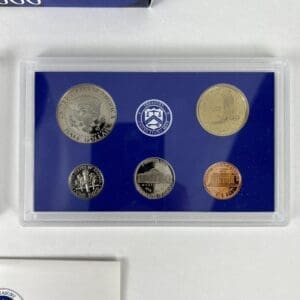 Coin set in blue display case.