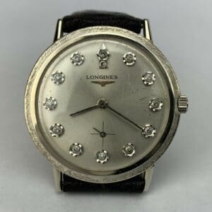 Silver wristwatch with diamond hour markers.