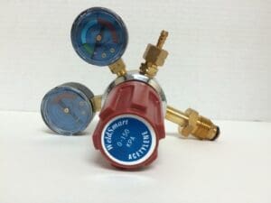 Acetylene pressure regulator with dual gauges.