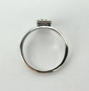 Silver ring with a small rectangular setting.