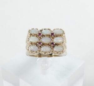 Gold ring with opals and small rubies.