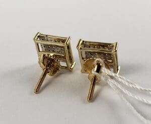 Gold stud earrings with screw backs.