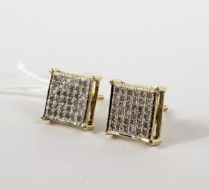 Square diamond stud earrings with gold setting.