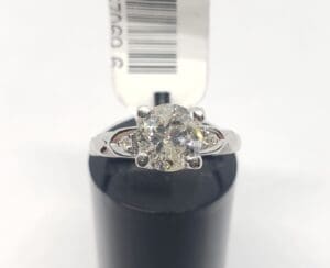 Diamond ring with price tag on display.