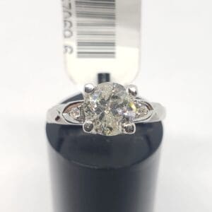 Diamond ring with price tag on display.