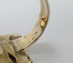 Gold ring with visible hallmark marking.