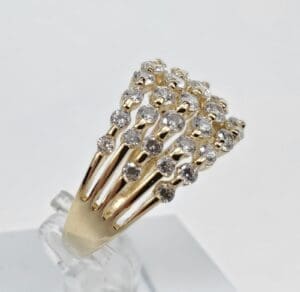 Gold ring with clustered diamond design.