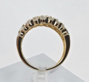 Gold ring with embedded gemstones.
