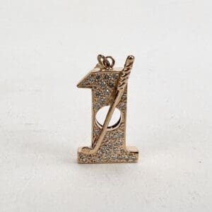 Gold baseball-themed number one pendant.