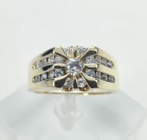 Gold ring with diamonds and central stone.