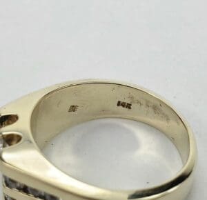 Gold ring with 14K hallmark inside band.