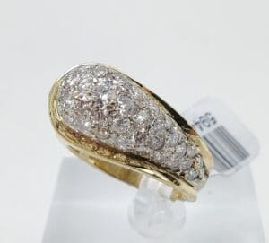 Gold ring with cluster of diamonds.