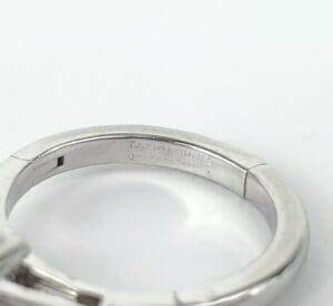 Silver ring with engraved inner inscription.