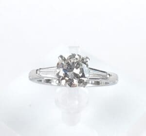 Diamond engagement ring with silver band.