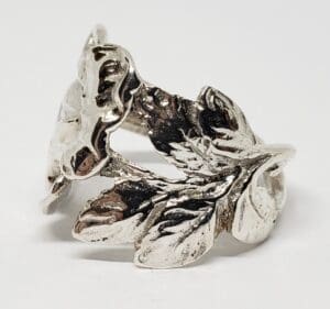 Silver ring with leaf design.
