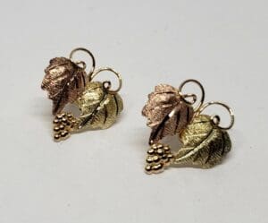 Gold and copper leaf grape earrings.
