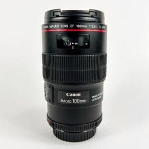Canon macro lens 100mm on white background.