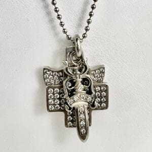 Sword and cross pendant with chain necklace.