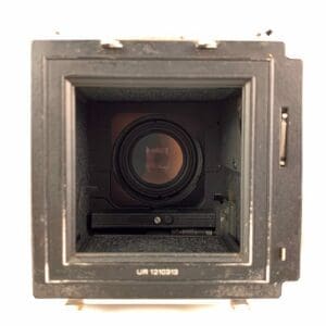 View inside an old camera lens box.