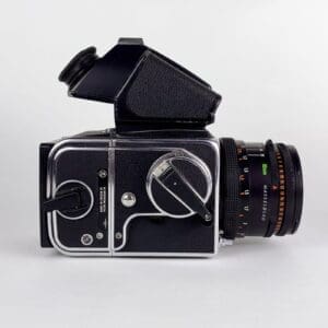 Vintage medium format camera on white background.