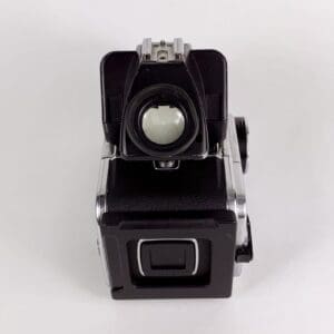 Vintage twin-lens reflex camera on display.