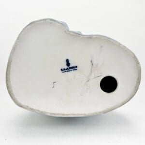 Bottom of a Lladro porcelain figurine.
