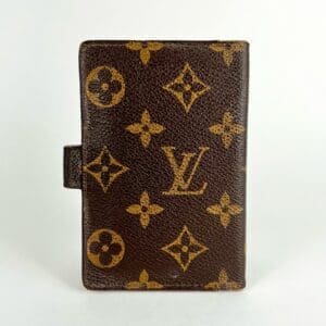 Brown designer wallet with monogram pattern.