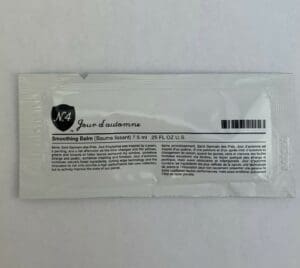 Packet of hair smoothing balm sample.