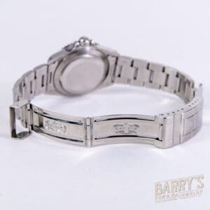 Silver watch with metal bracelet clasp.