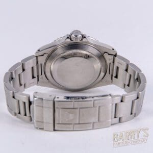 Back view of a stainless steel watch.