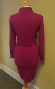 Purple dress on mannequin, back view.