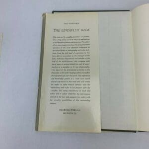 Open book titled "The Leicaflex Book".