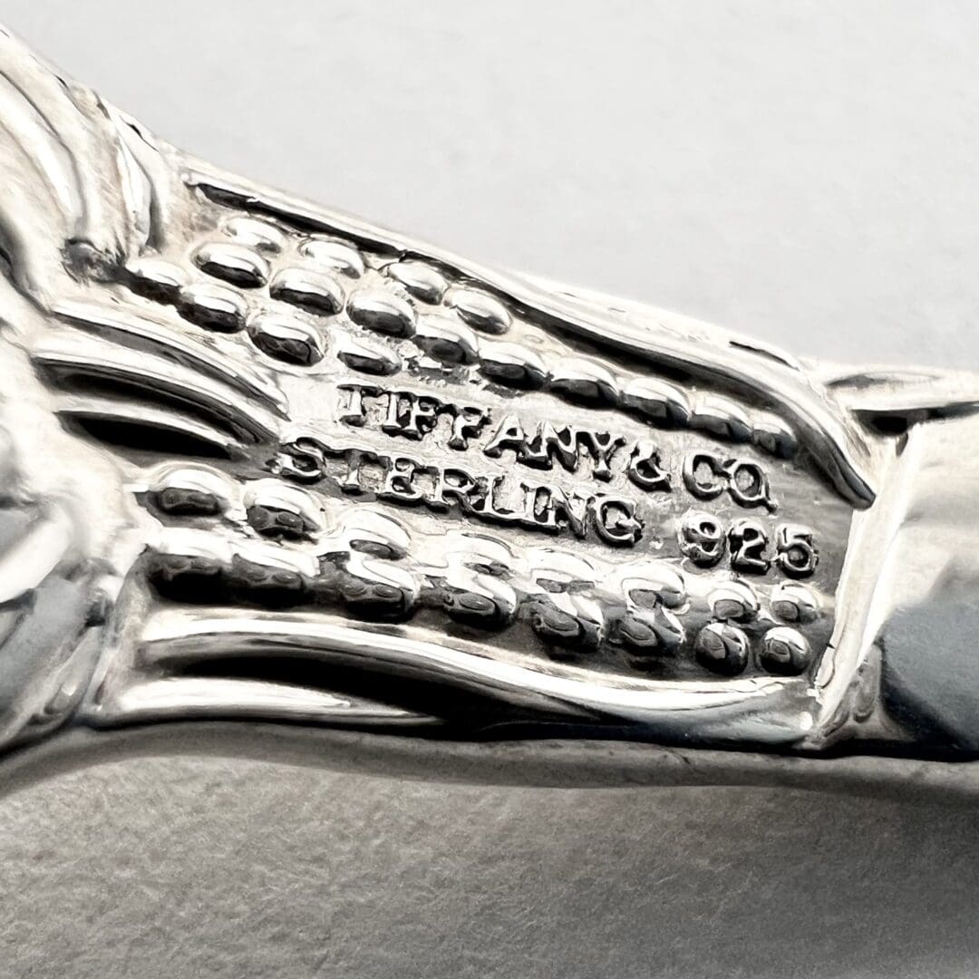 Tiffany & Co. sterling silver utensil detail.