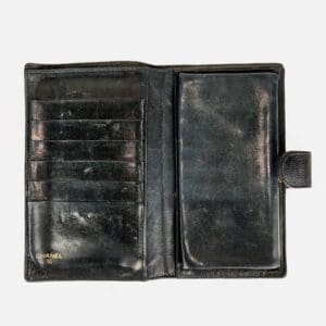 Black leather wallet with card slots.