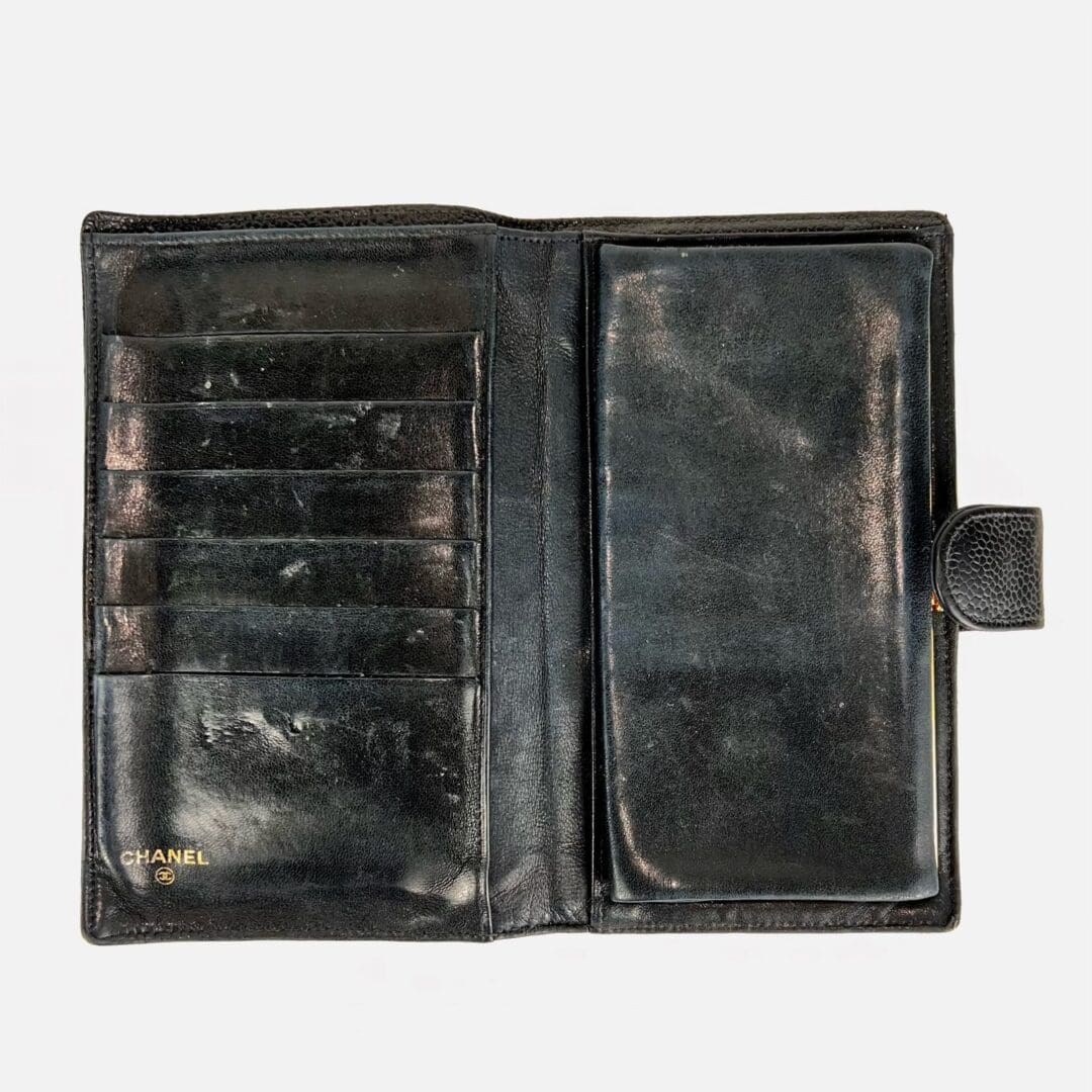 Black leather wallet with card slots.