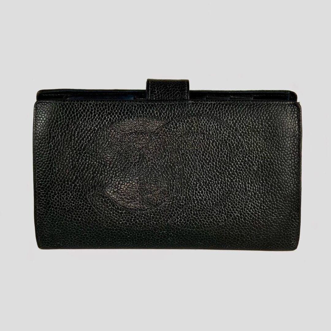 Black leather wallet with textured surface.