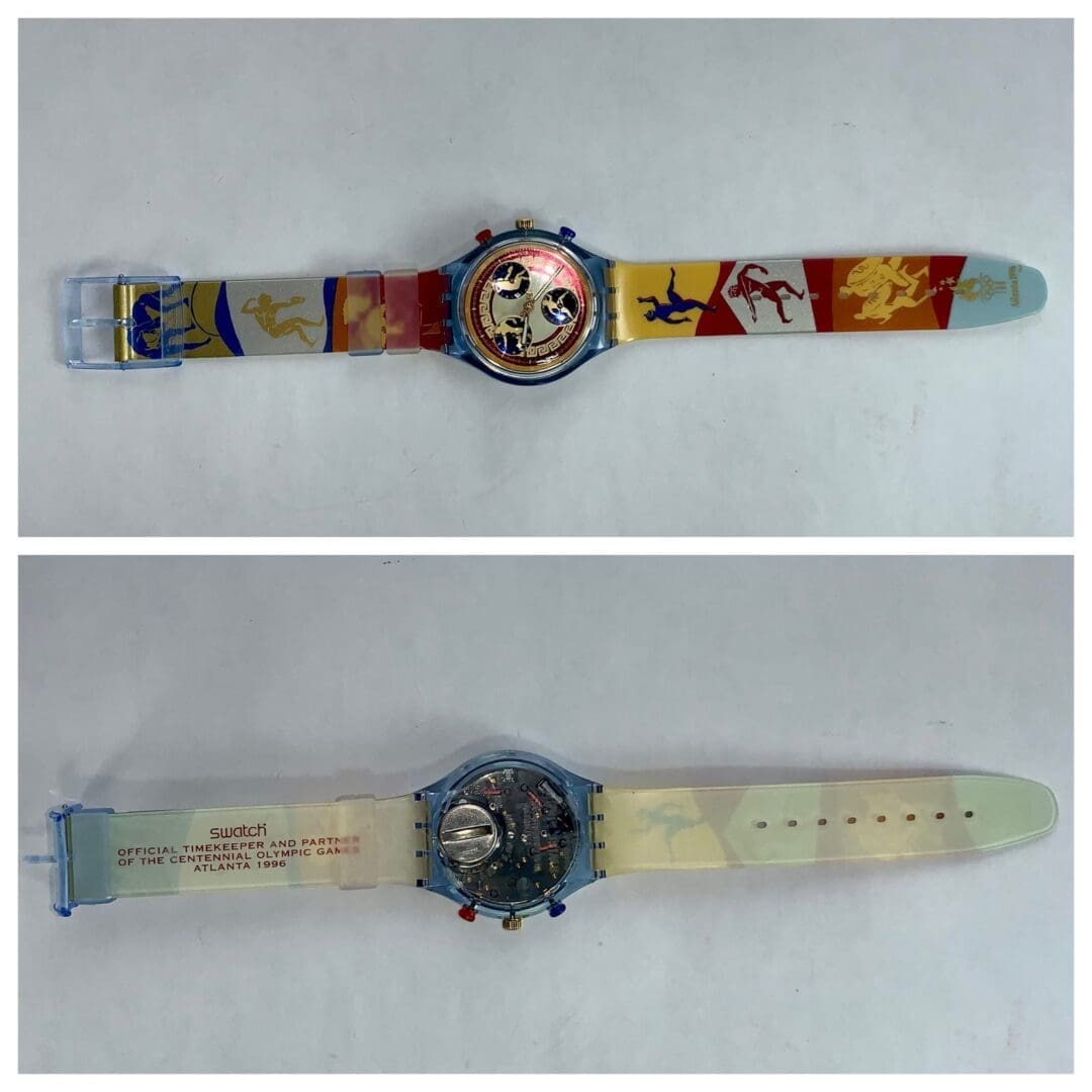 Colorful Swatch watch with zodiac designs.
