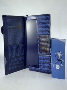 Blue box with 1994 runner design.