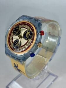 Colorful wristwatch with intricate dial design.