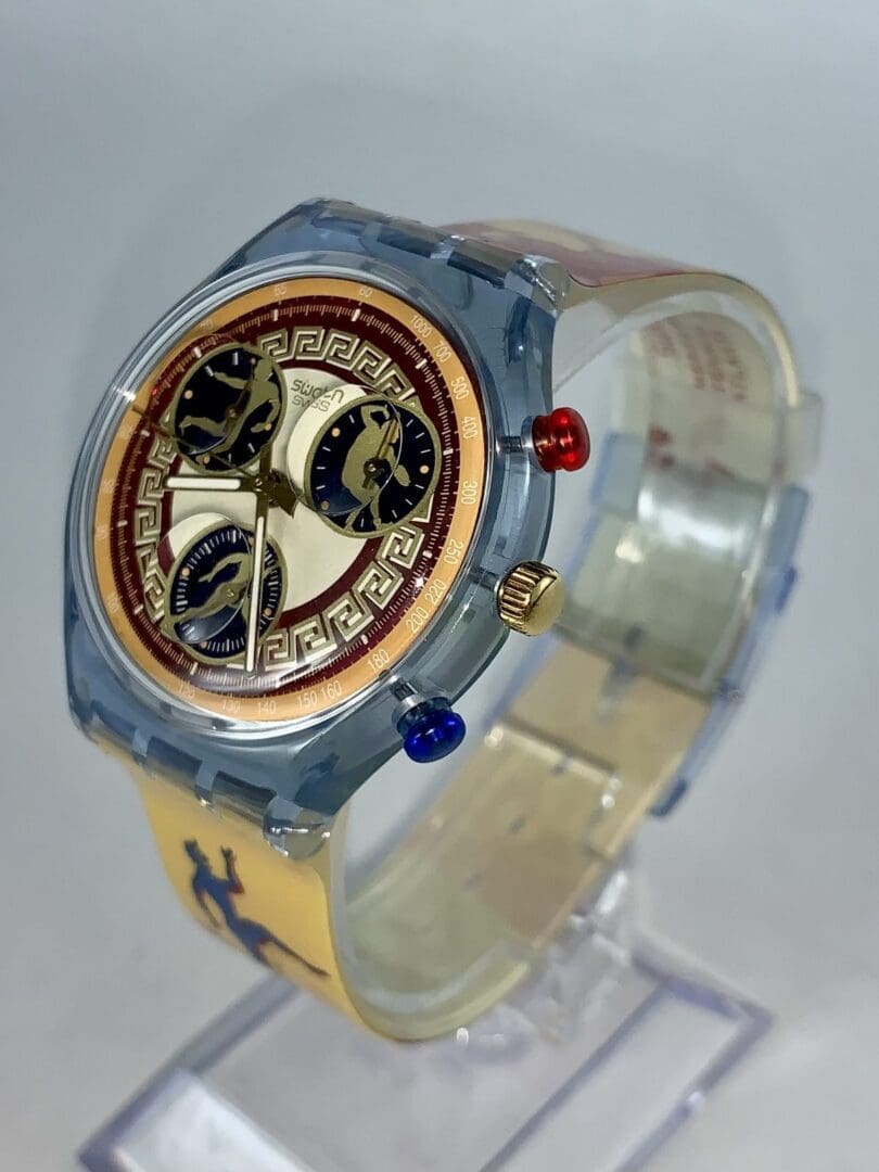 Colorful wristwatch with intricate dial design.