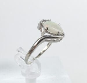 Silver ring with an opal gemstone.