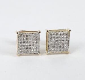 Square diamond earrings with gold setting.